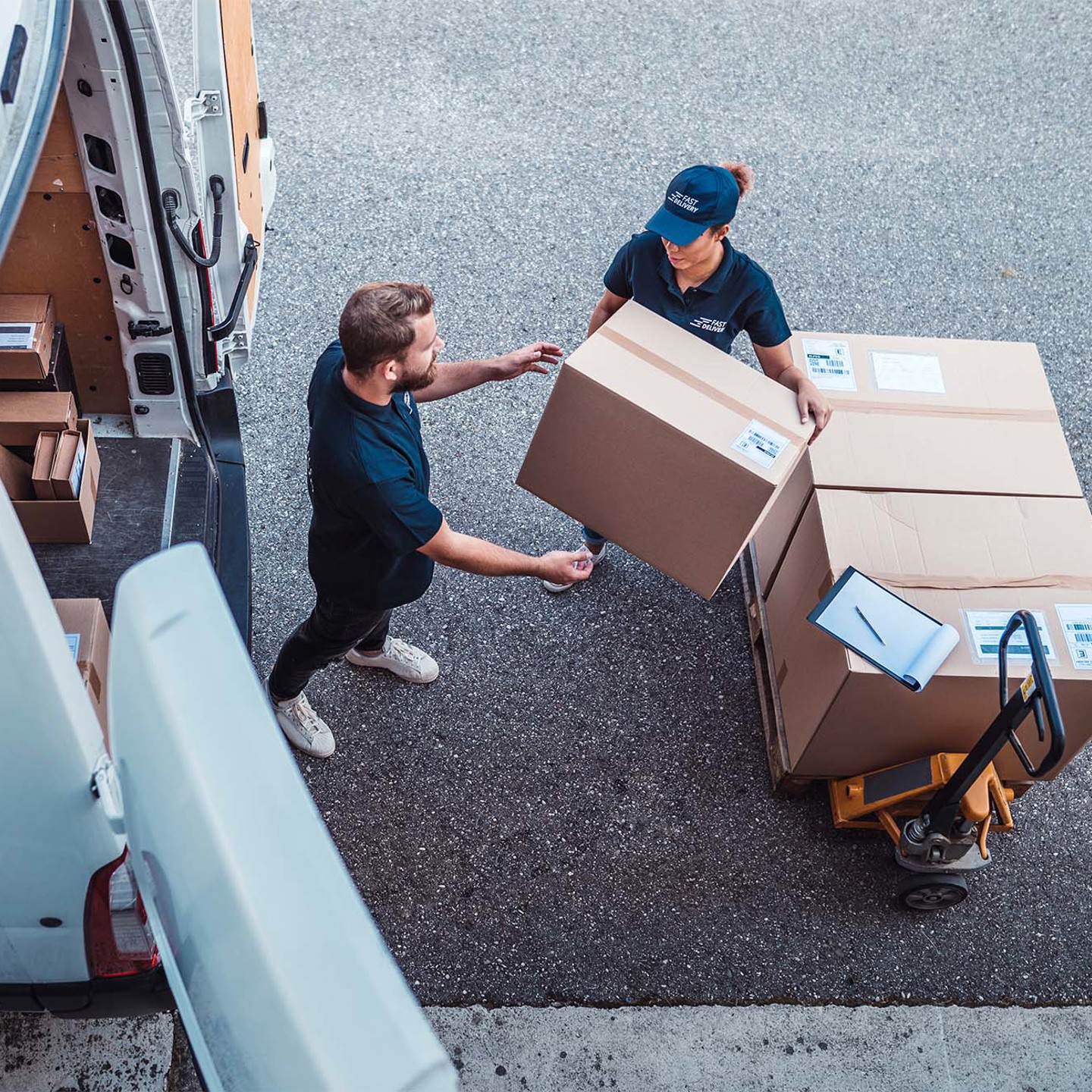 Woman handing box to man